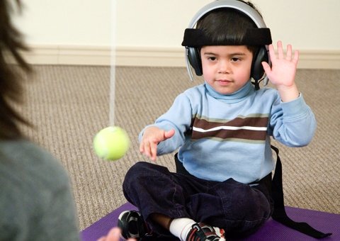 child engaging in integrated listening systems